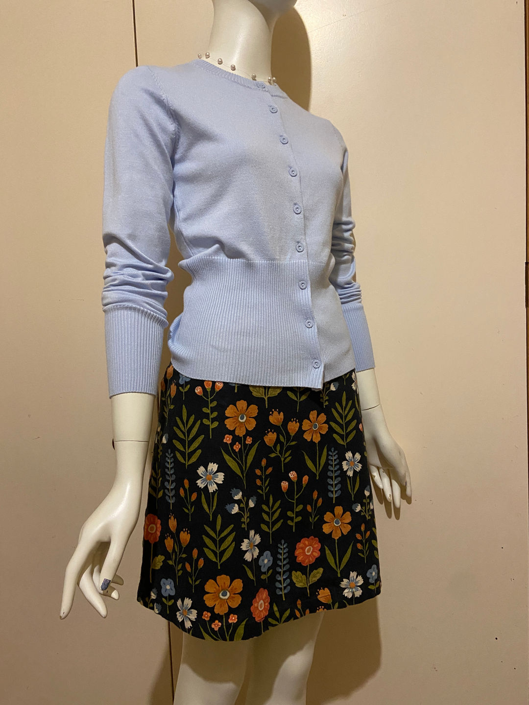 Women's Cardigan and Floral Skirt Outfit