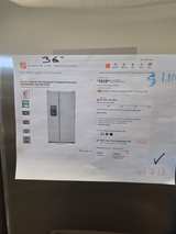 GE 25.3 Cu. Ft. Side-By-Side Refrigerator - Image 1