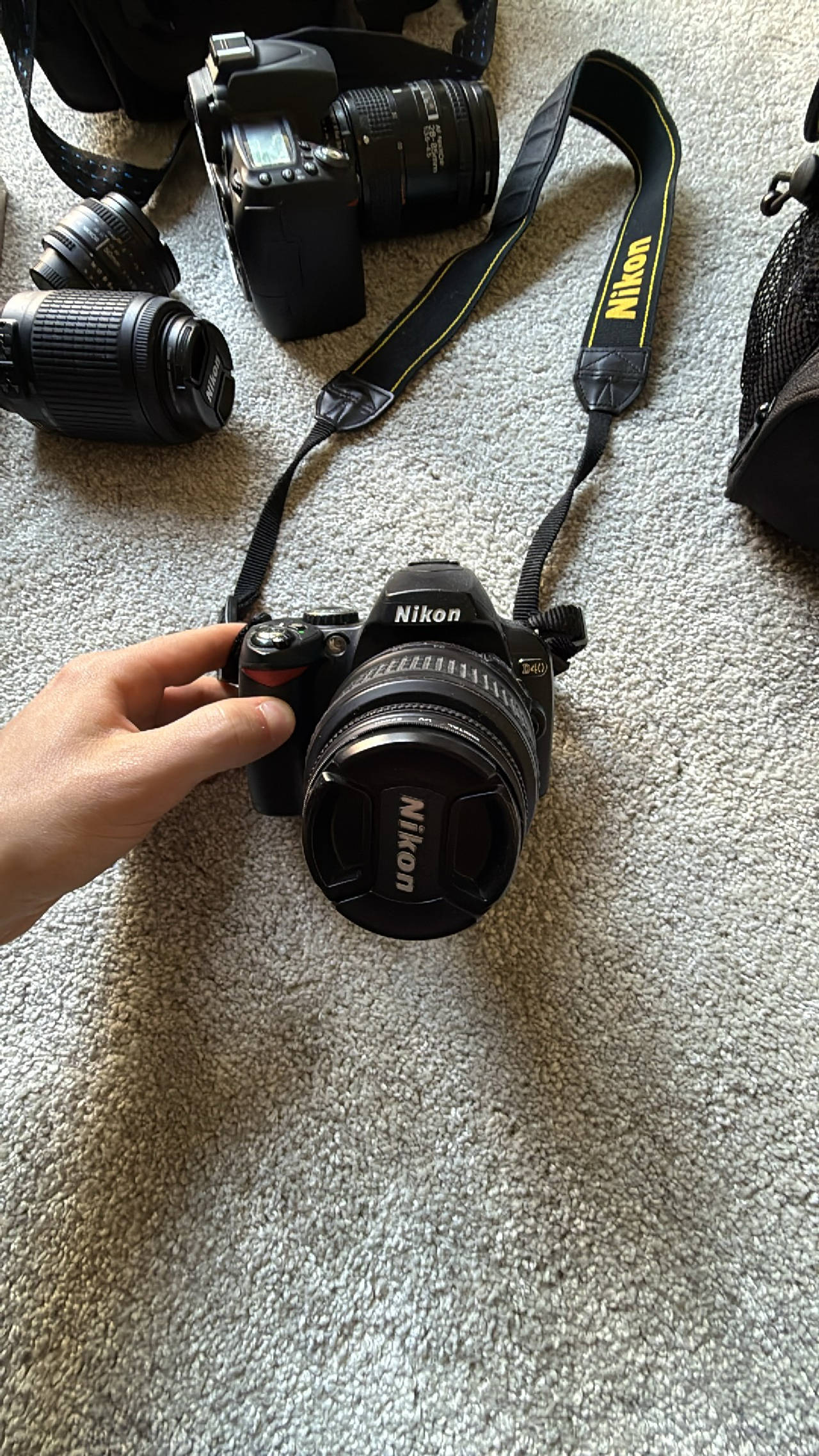 Nikon D40 DSLR Camera with 52mm Zoom Lens, ND Filter, Strap, and Bag