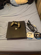 PlayStation 4 Pro 1tb + the last of us part ll - Image 1