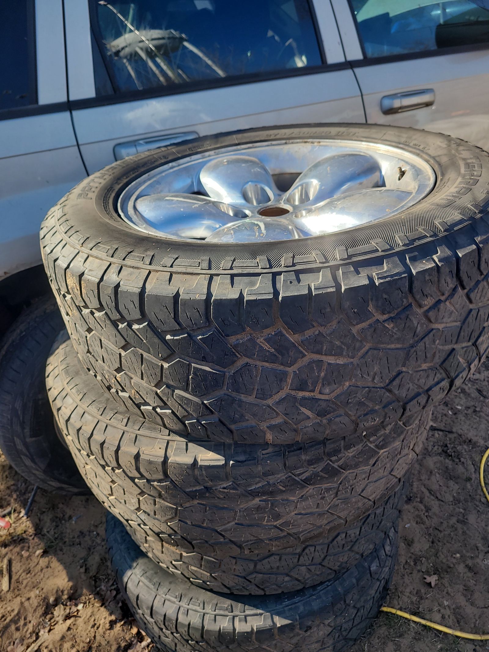 Dodge Ram 1500 20" Chrome Wheels with Nitto Terra Grappler G2 Tires