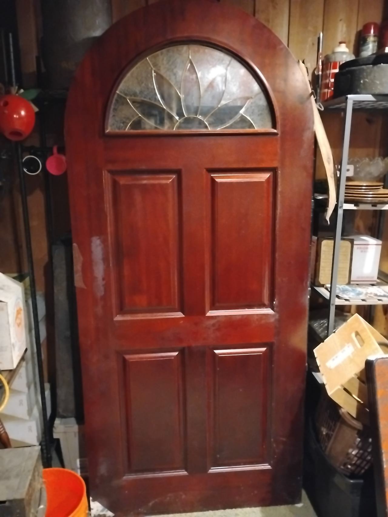 Arched Wood Entry Door with Sunburst Glass