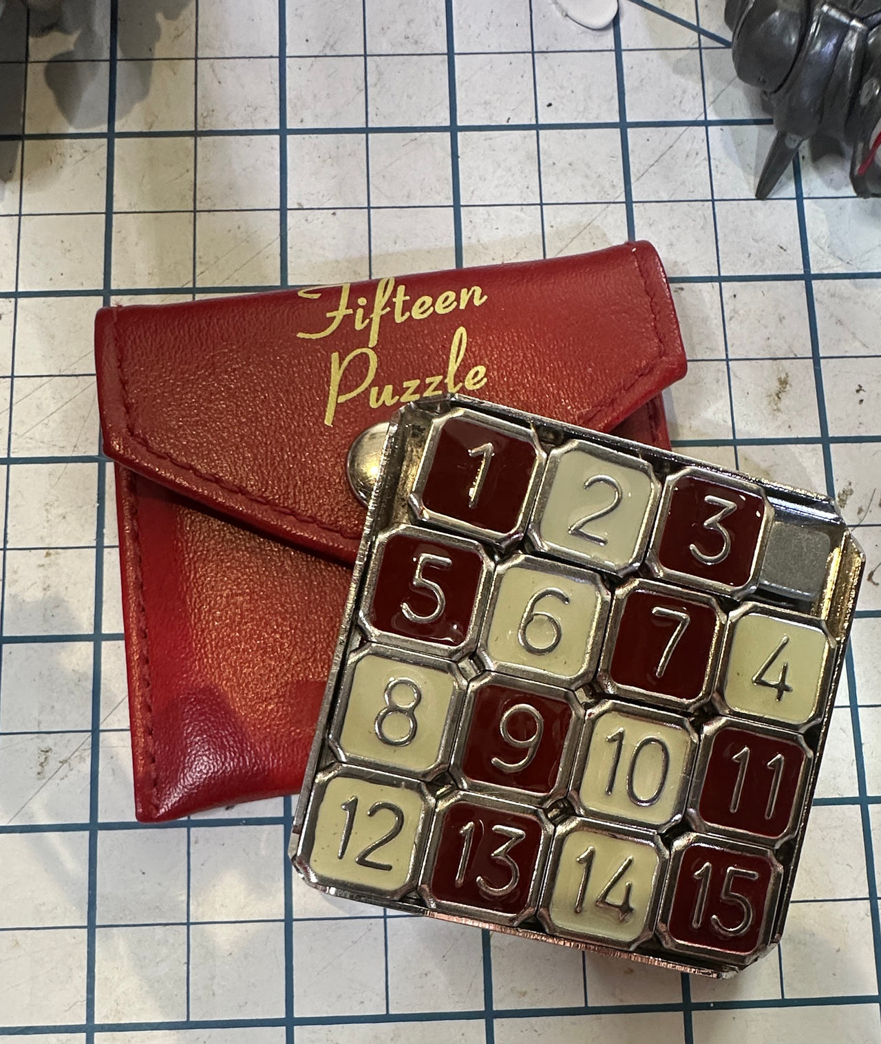 Vintage Metal Fifteen Puzzle with Red Pouch