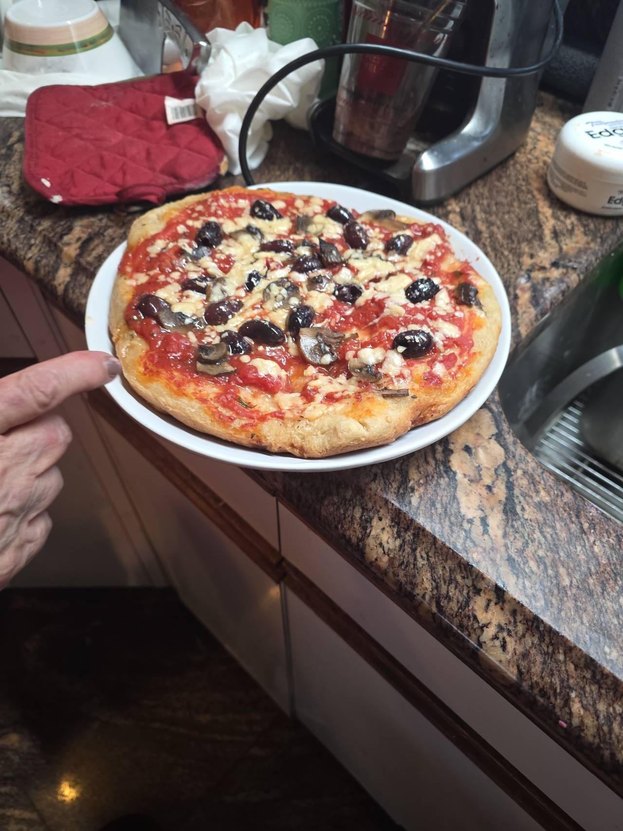 Homemade Pizza with Olives and Mushrooms