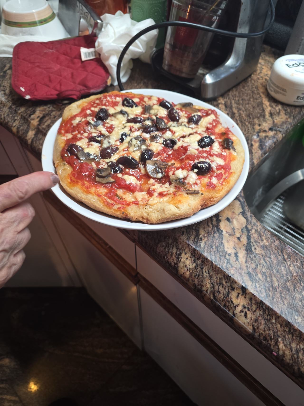Homemade Pizza with Olives and Mushrooms