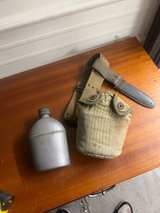 U.S. Military WWII Metal Water Canteen with Canvas Carrier - Image 1