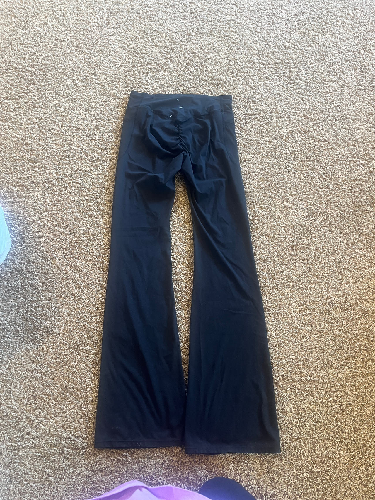 Halara Crossover Back Scrunch Flare Leggings size large. Have pockets no flaws