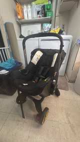 Doona Infant Car Seat/Stroller + Canopy + travel Bag + Dock - Image 4