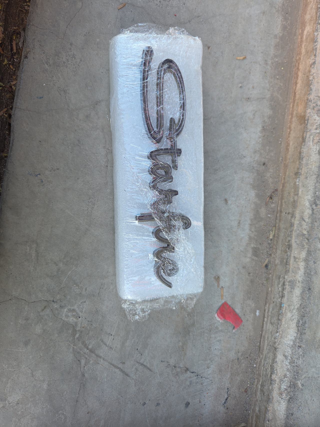 Oldsmobile Starfire Chrome Script Emblem