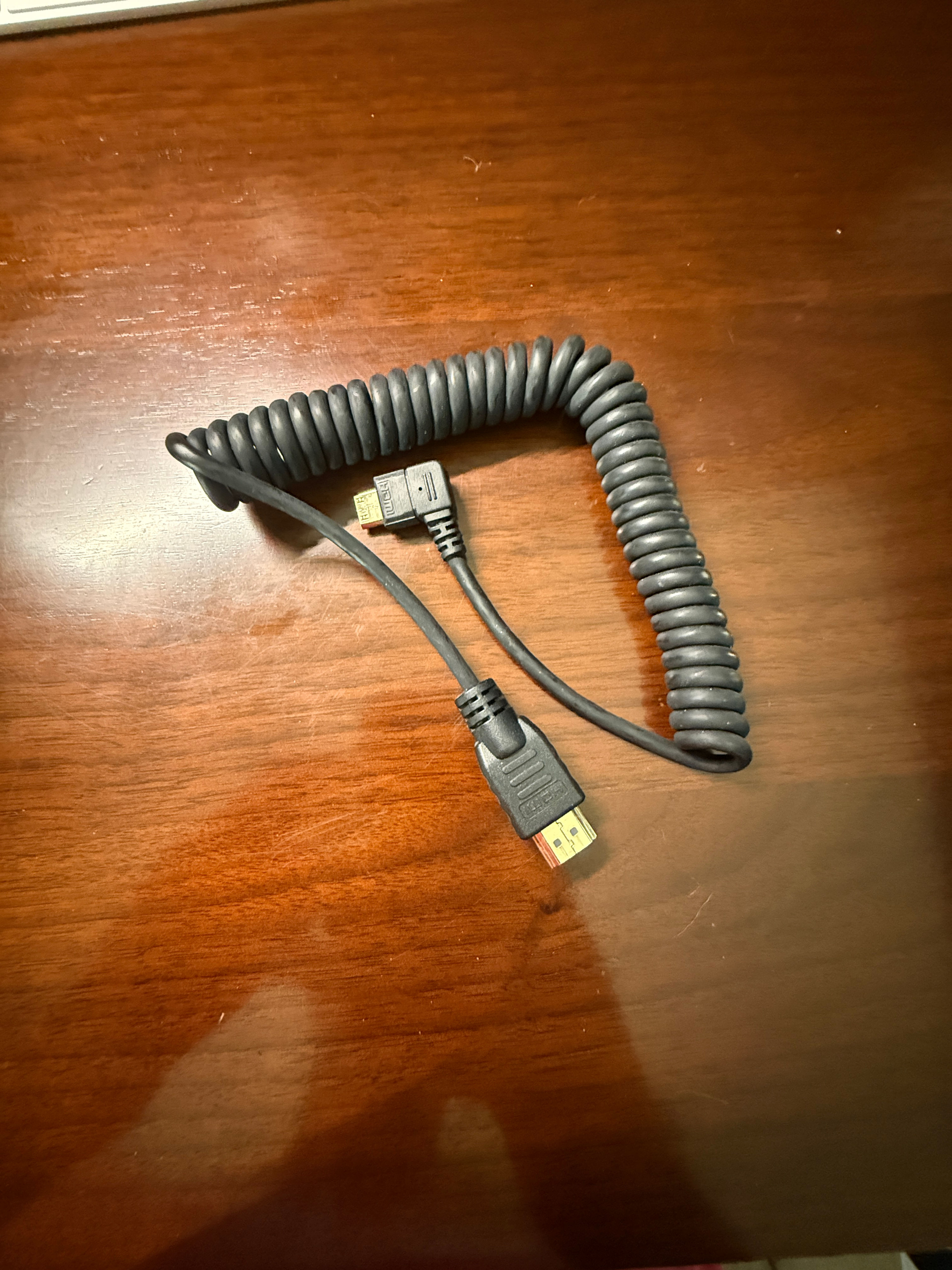 Coiled Mini HDMI to HDMI Cable with Right Angle Connector