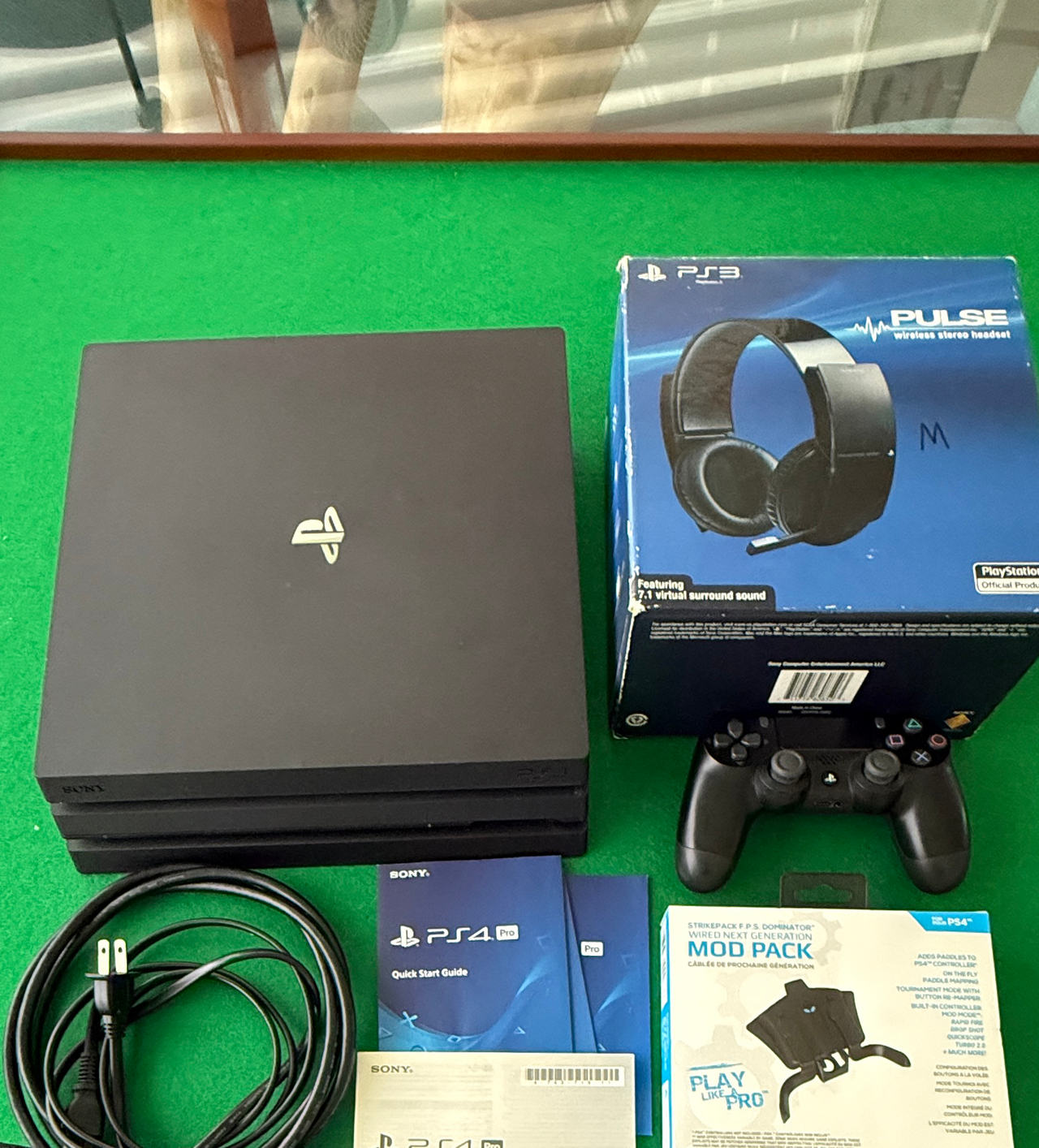 Sony PlayStation 4 Pro 1TB Bundle with Pulse Headset & Strike Pack