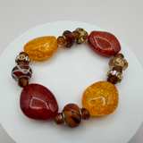 Chunky Amber and Red Resin Stretch Bracelet - Image 1