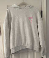 Brandy Melville Christy Pink Bow Hoodie - Image 1