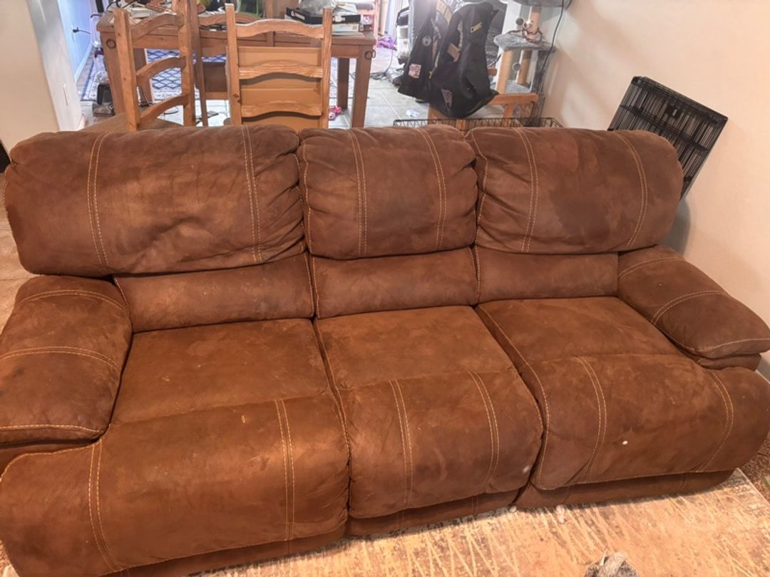 **MUST GO**
Brown Reclining Sofa