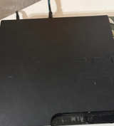 Sony PlayStation 3 Slim - Image 1