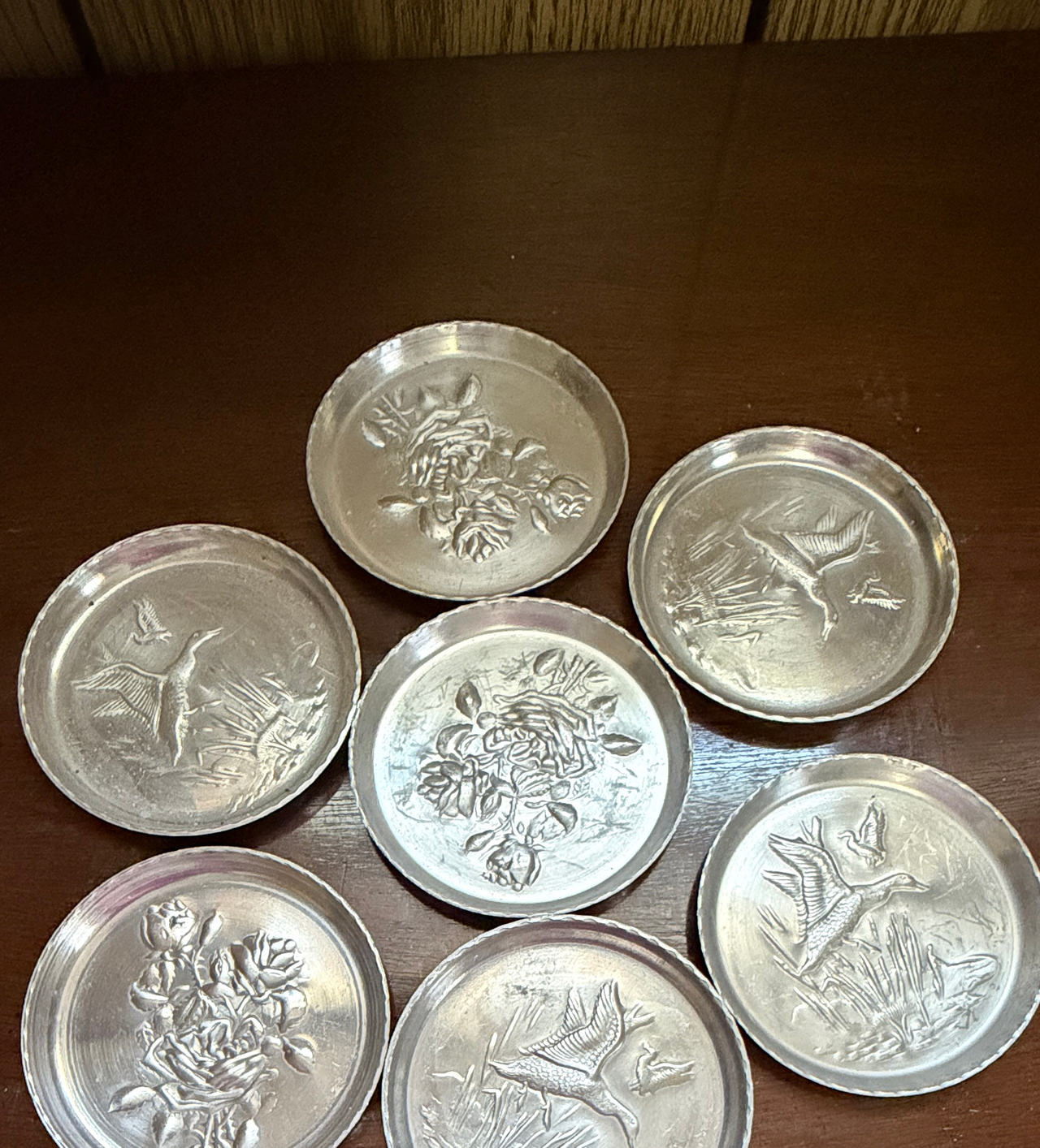 Vintage Embossed Aluminum Coasters Set of 7