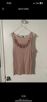 Sleeveless Blouse with Floral Neckline - Image 1