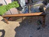 Antique black carved oak low table with lion-leg design. - Image 1