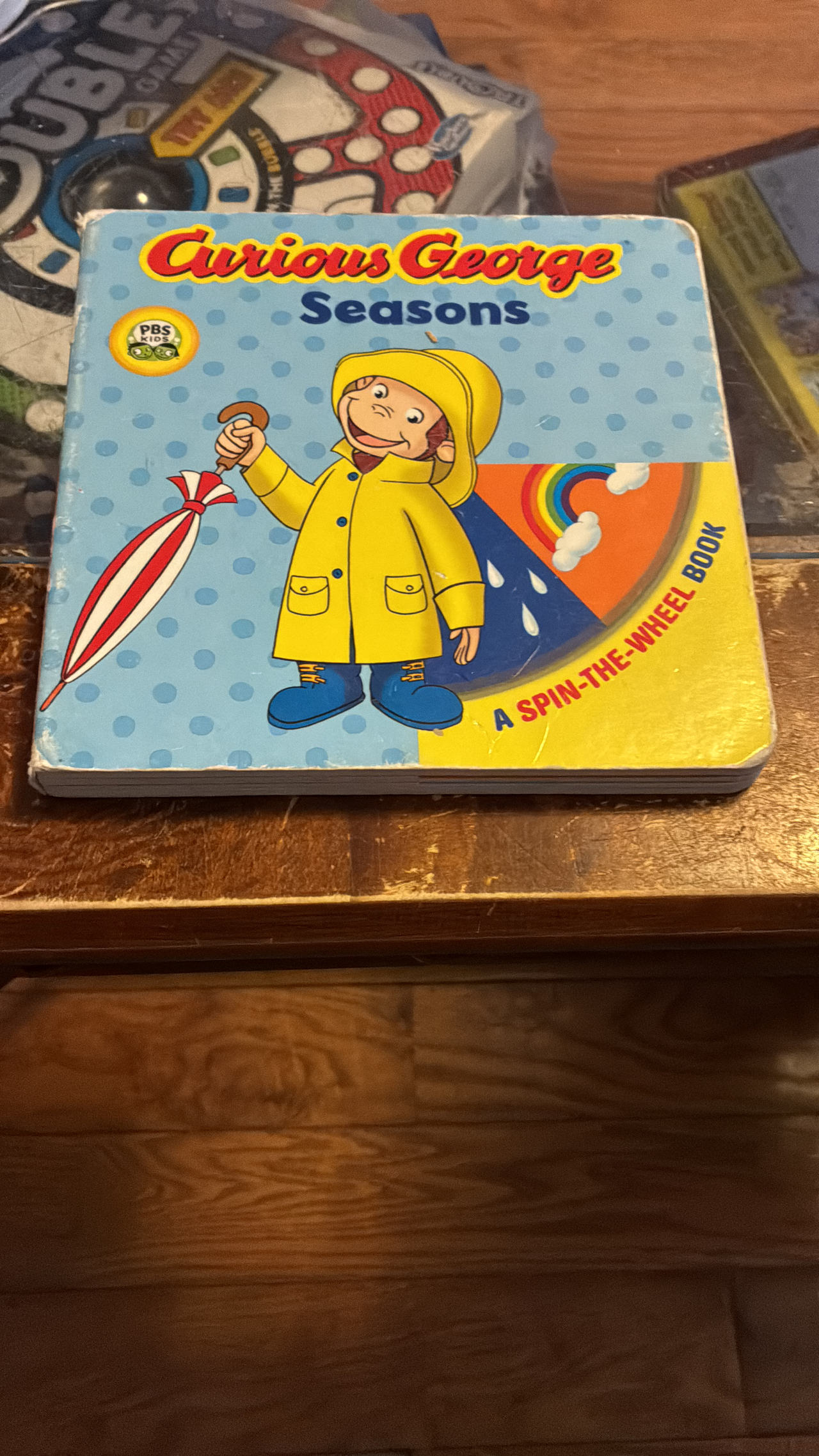 Curious George Seasons: A Spin-the-Wheel Book