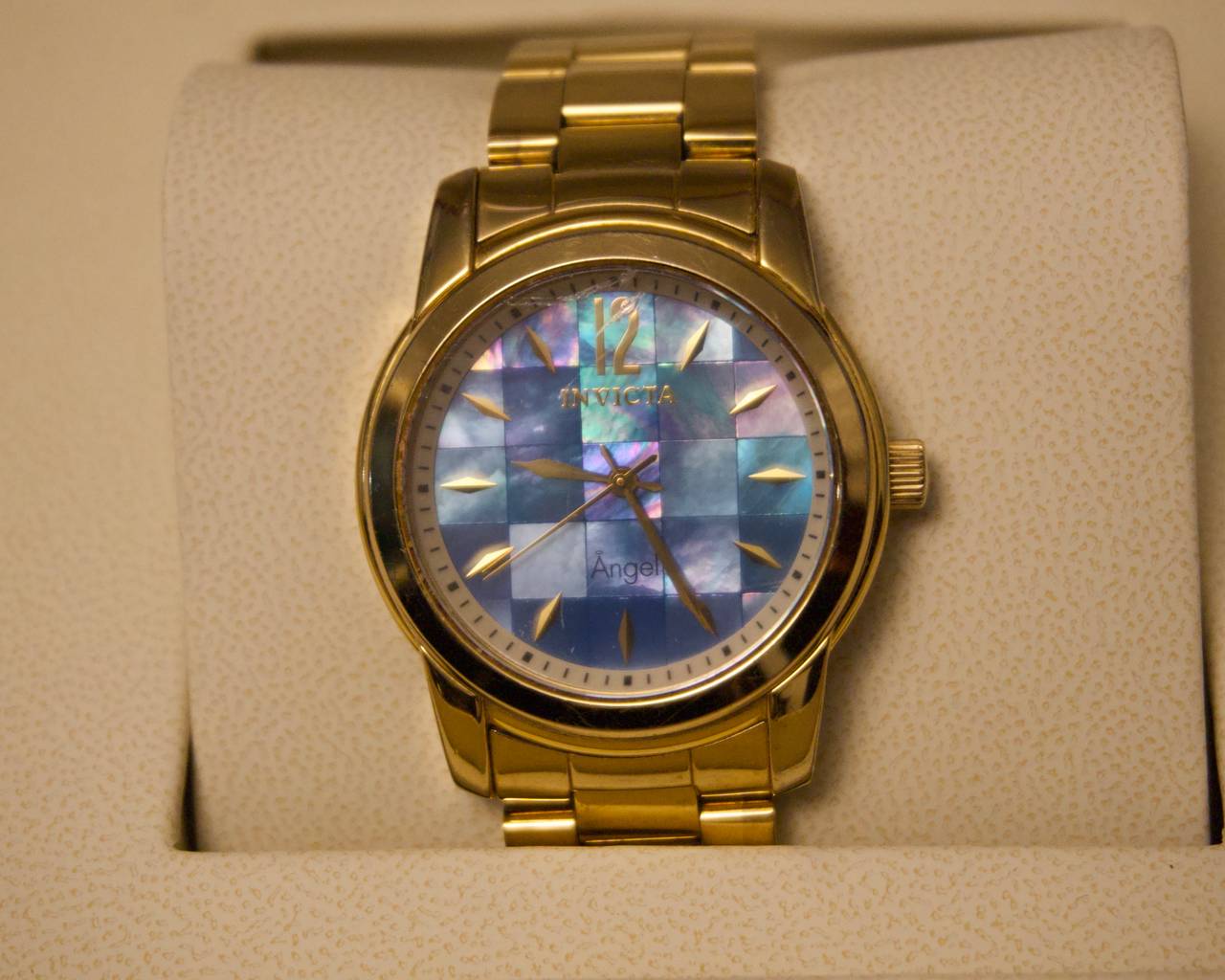 Invicta Angel Lady 12629 – 38 mm Gold-tone, Blue MOP Dial, Swiss Quartz