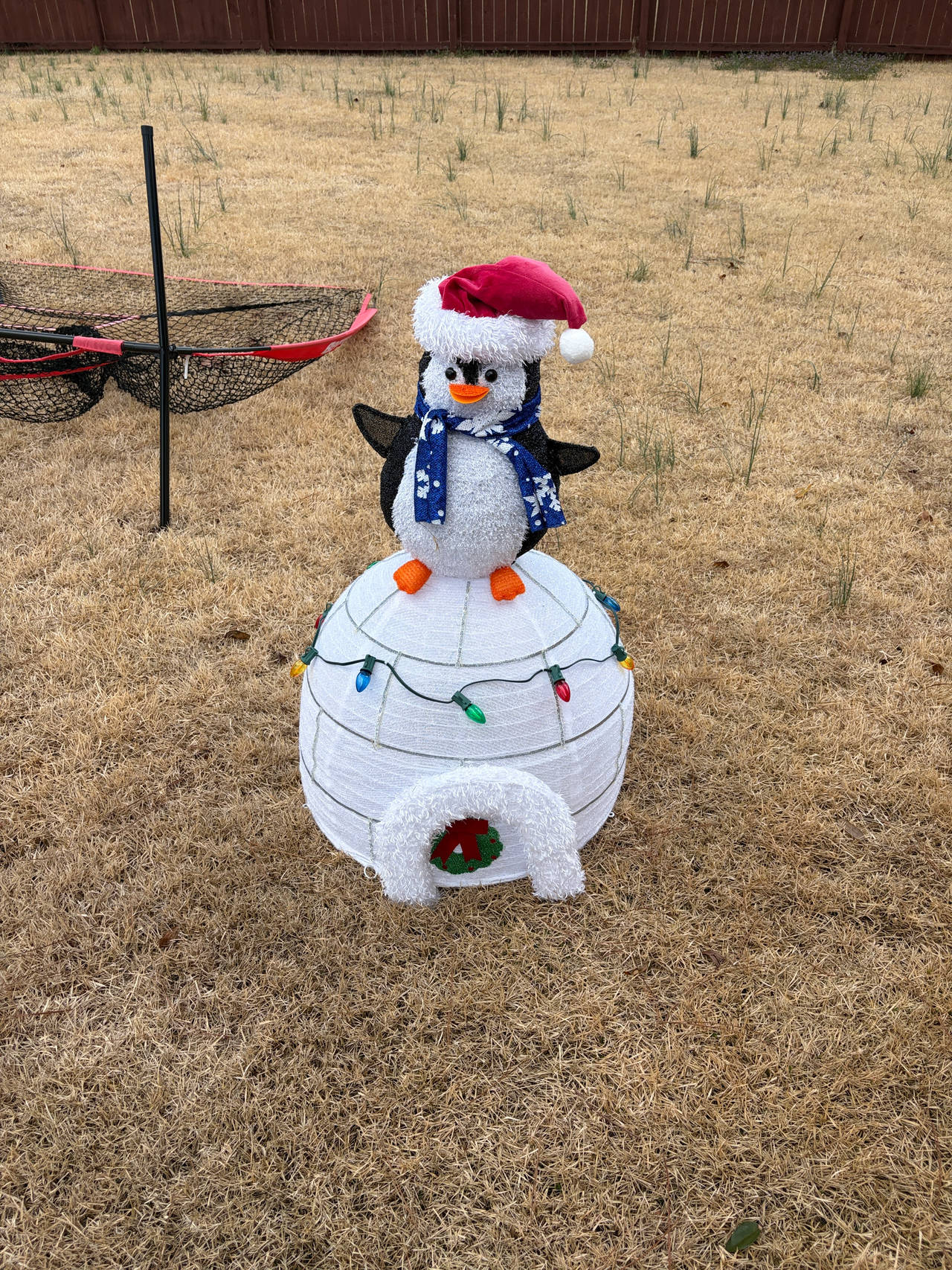 Holiday Time Light-up Tinsel Penguin on Igloo Outdoor Christmas Decor