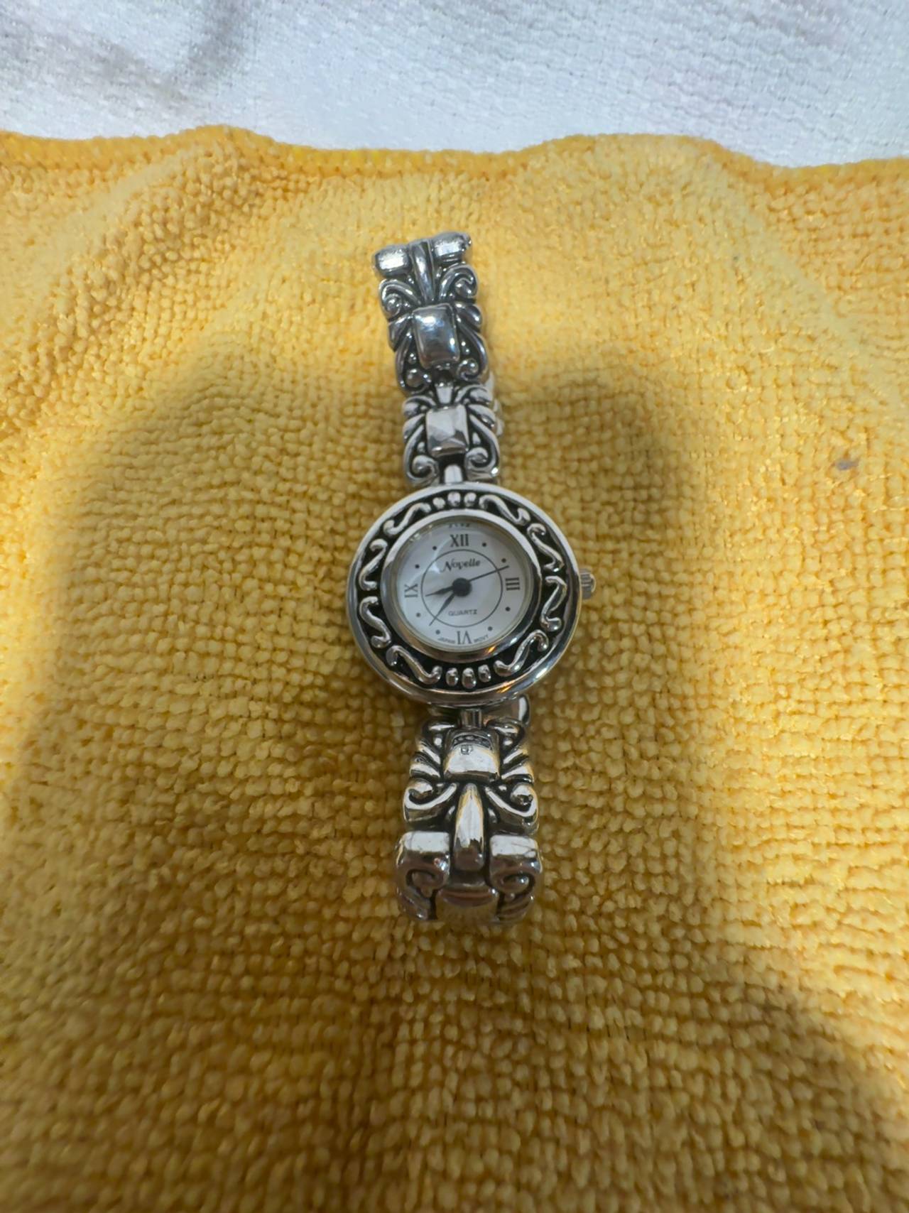 Novelle Ladies Silver Toned Analog Metal Band Watch with Roman Numerals