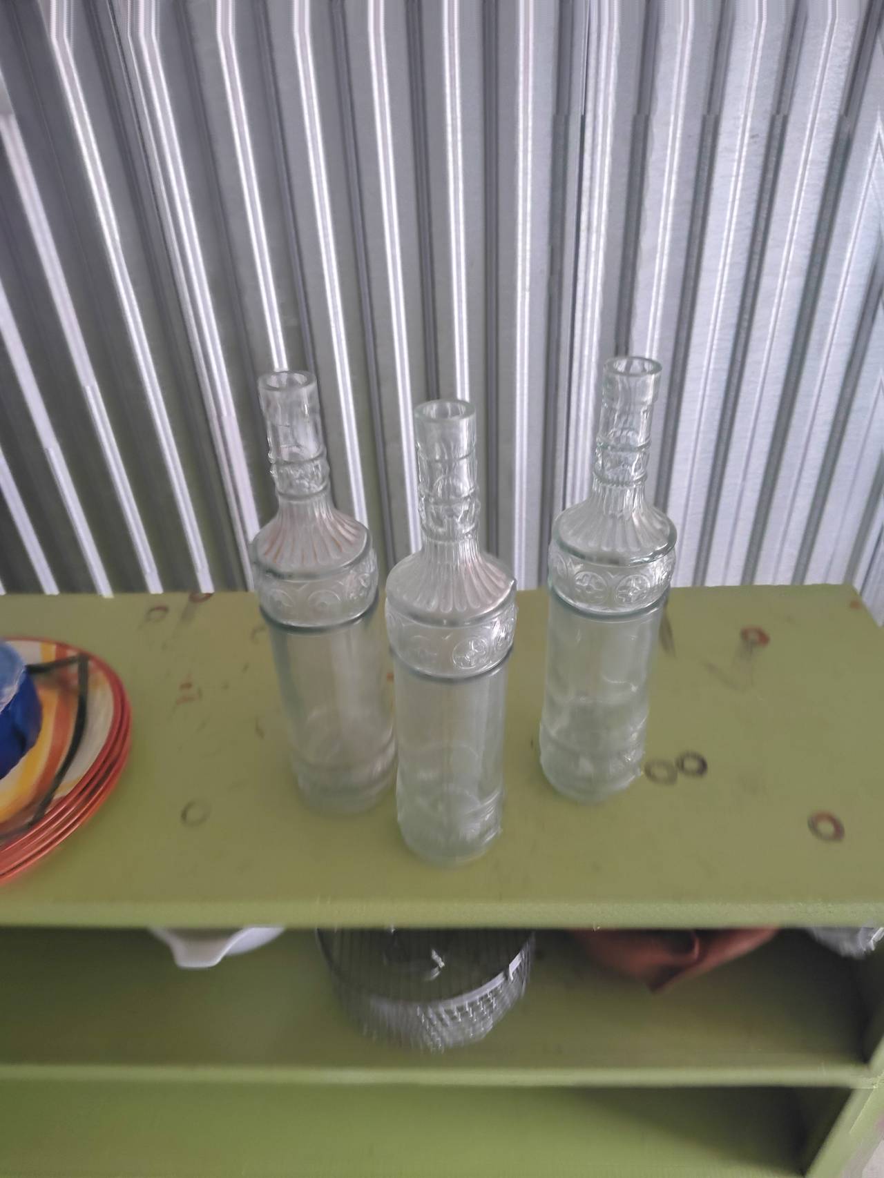 Vintage Embossed Clear Glass Bottles