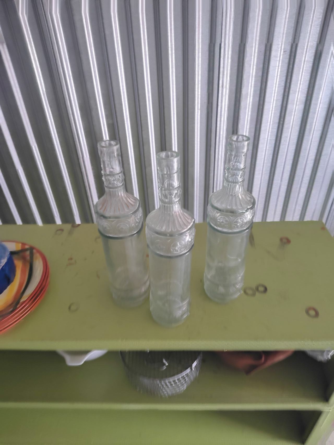 Vintage Embossed Clear Glass Bottles