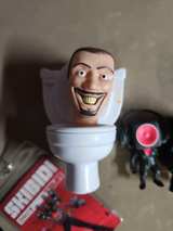 Skibidi Toilet Collectible Figures and Lanyard Set - Image 1