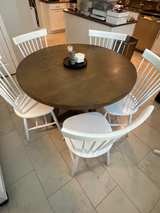 Living Spaces Round Wooden Dining Table with White Spindle Back Chairs - Image 2
