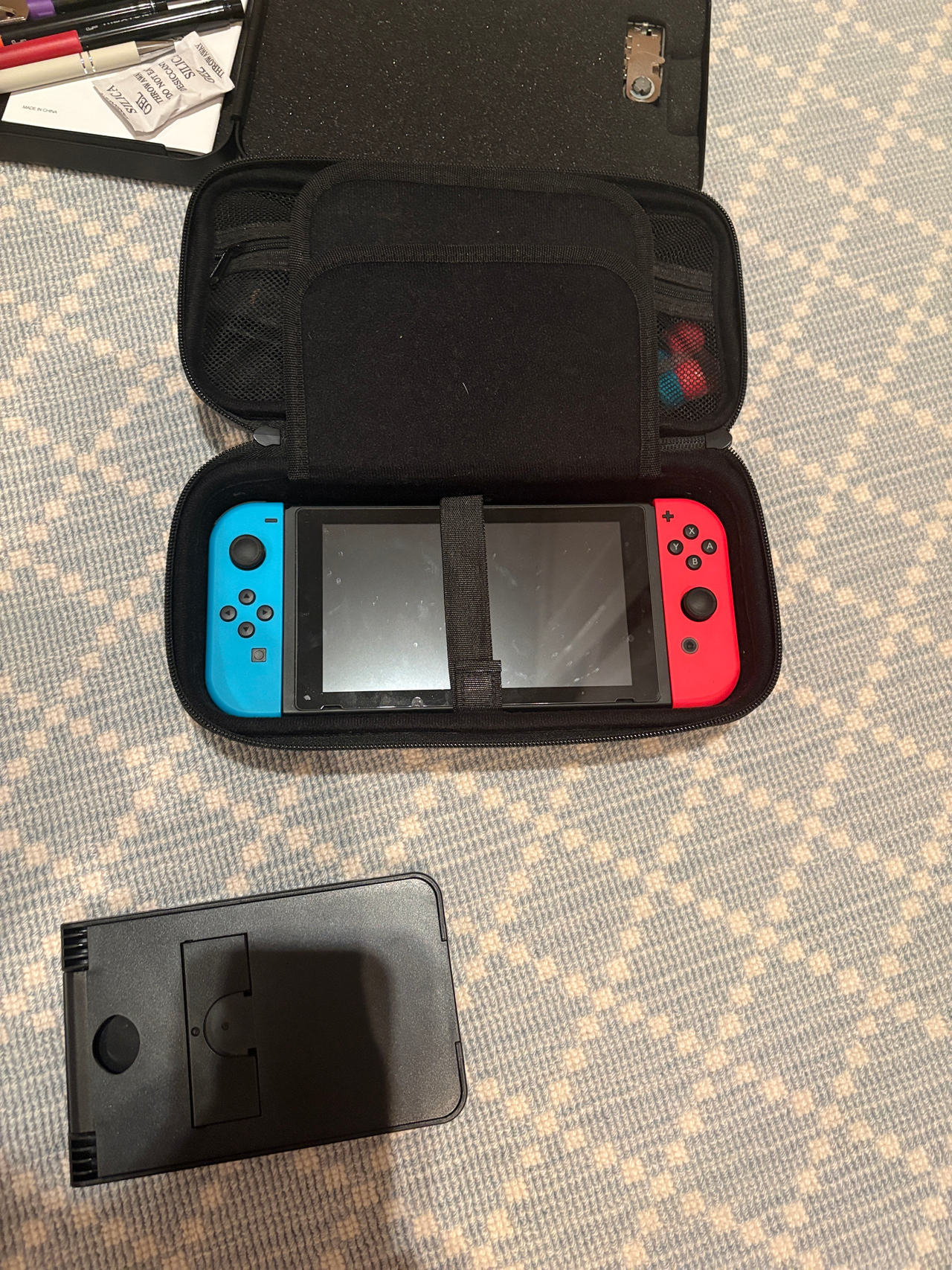 Nintendo Switch with Neon Blue and Neon Red Joy-Con