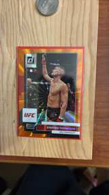 2022 Panini Donruss UFC Stephen Thompson Orange Laser Parallel #144 - Image 2