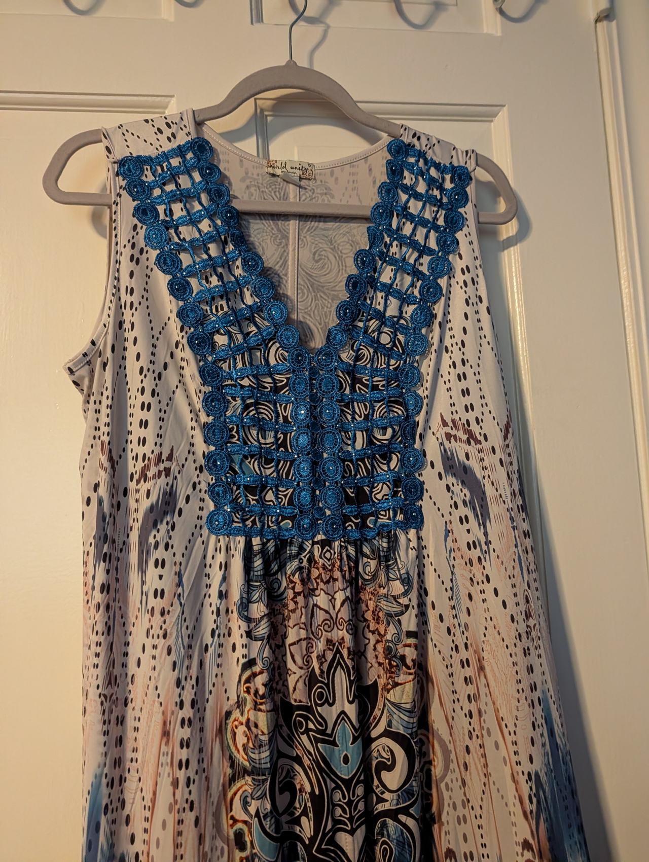 World Unity Sleeveless Crochet Trim V-Neck Top