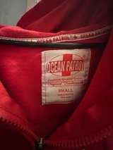 Ocean Patrol Red Hoodie small
Tube island - Image 3