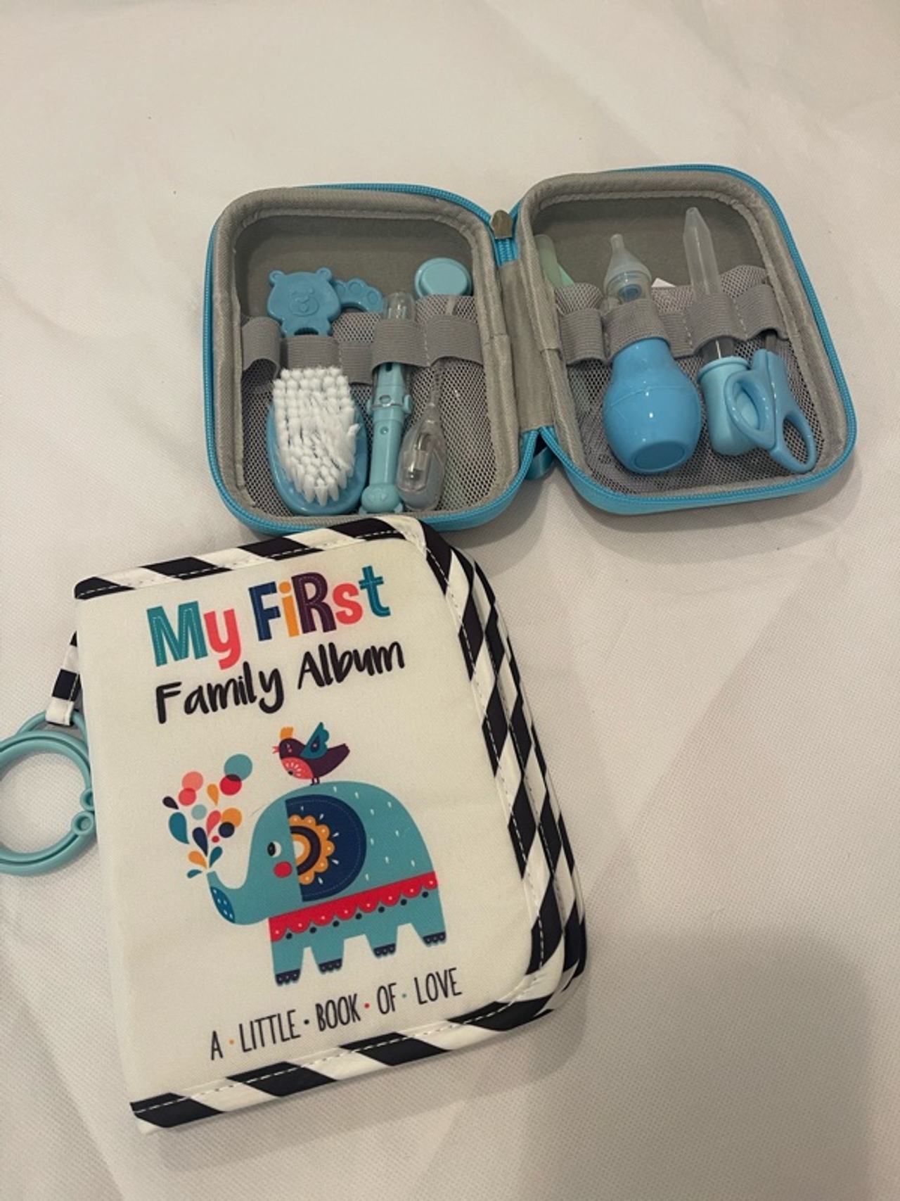 Baby's My First Family Album and first aid kit