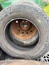 Goodyear Fortera HL P245/65R17 Tire on Steel Rim - Image 1