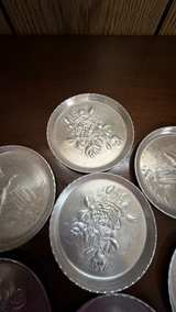 Vintage Embossed Aluminum Coasters Set of 7 - Image 5