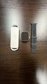Apple Watch Ultra 2 (GPS + Cellular, 49mm) Black Titanium Case with Black Ocean Band - Image 2