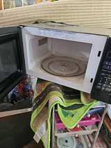 Insignia 0.7 Cu. Ft. Compact Microwave - Image 1