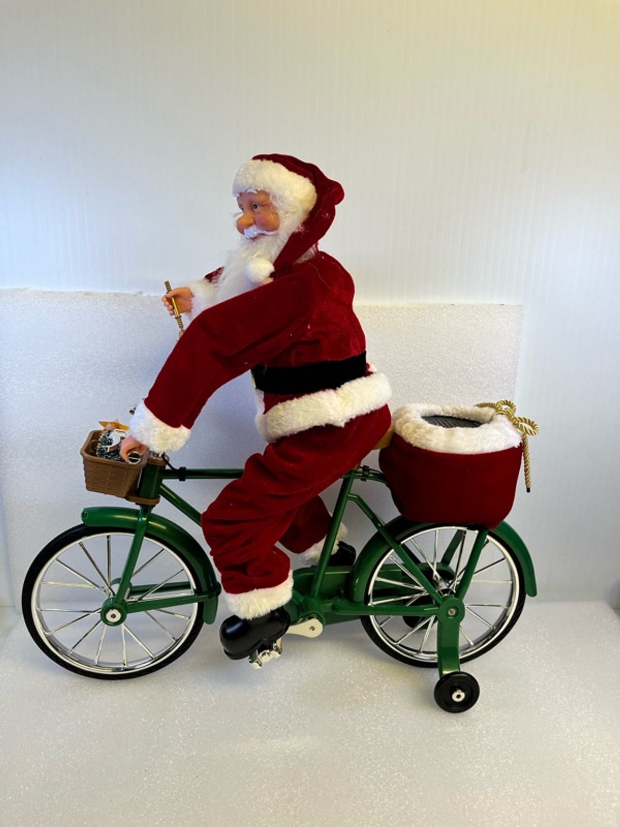 Santa Claus Riding a Bicycle Christmas Figurine