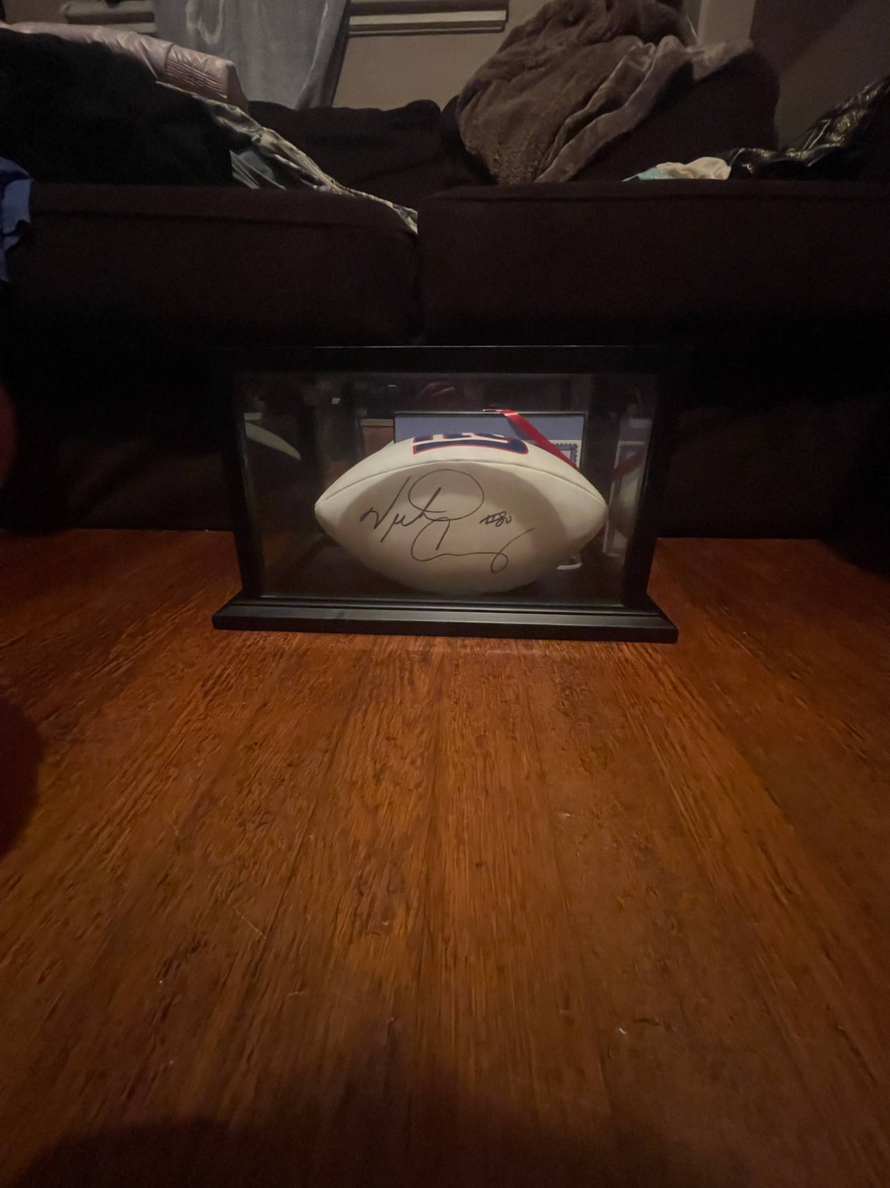 Autographed NFL Victor Cruz  Football in Display Case