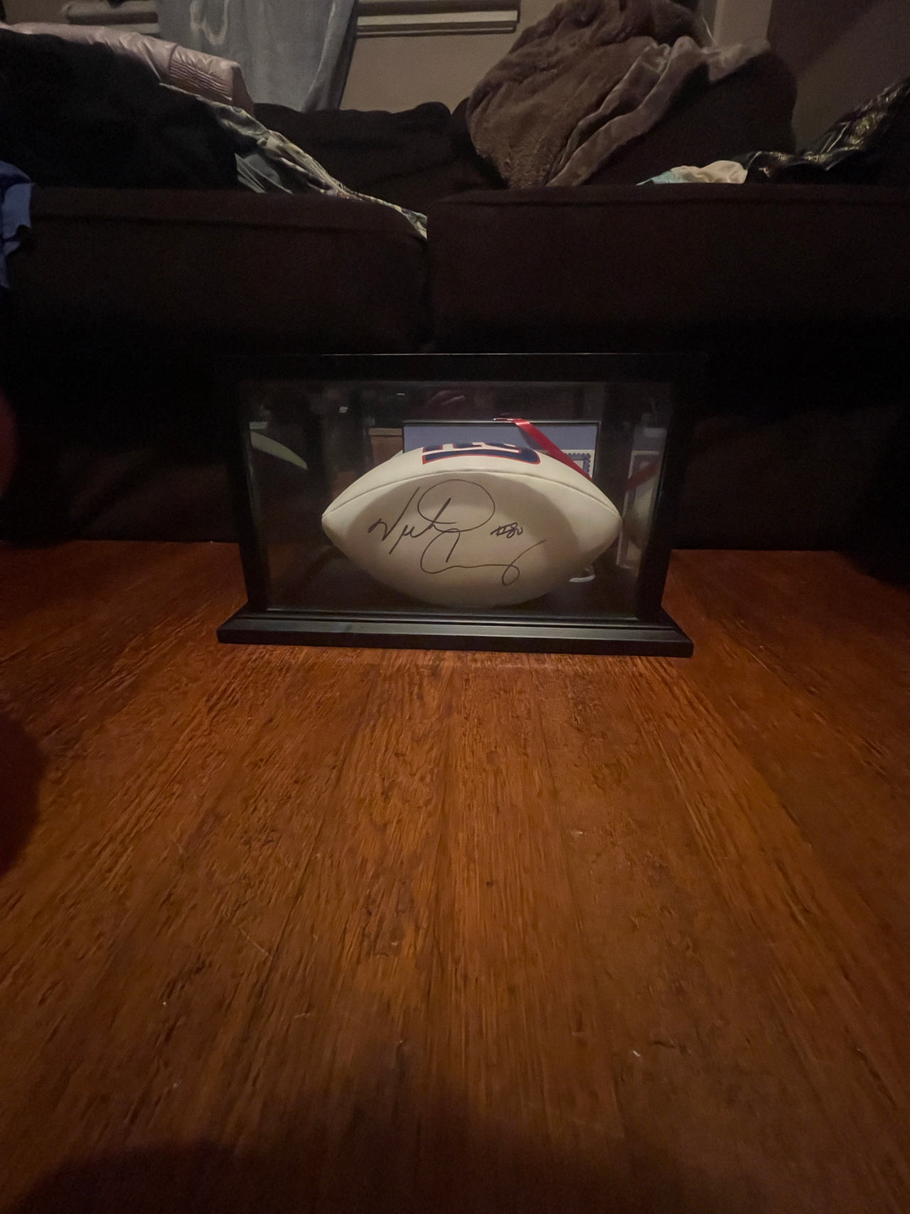 Autographed NFL Victor Cruz  Football in Display Case
