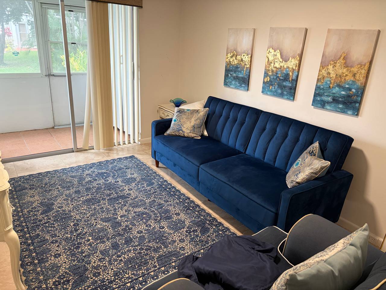 FULL ROOM DECOR-  Includes Navy Blue Velvet Tufted Sofa bed , rug , art , chair