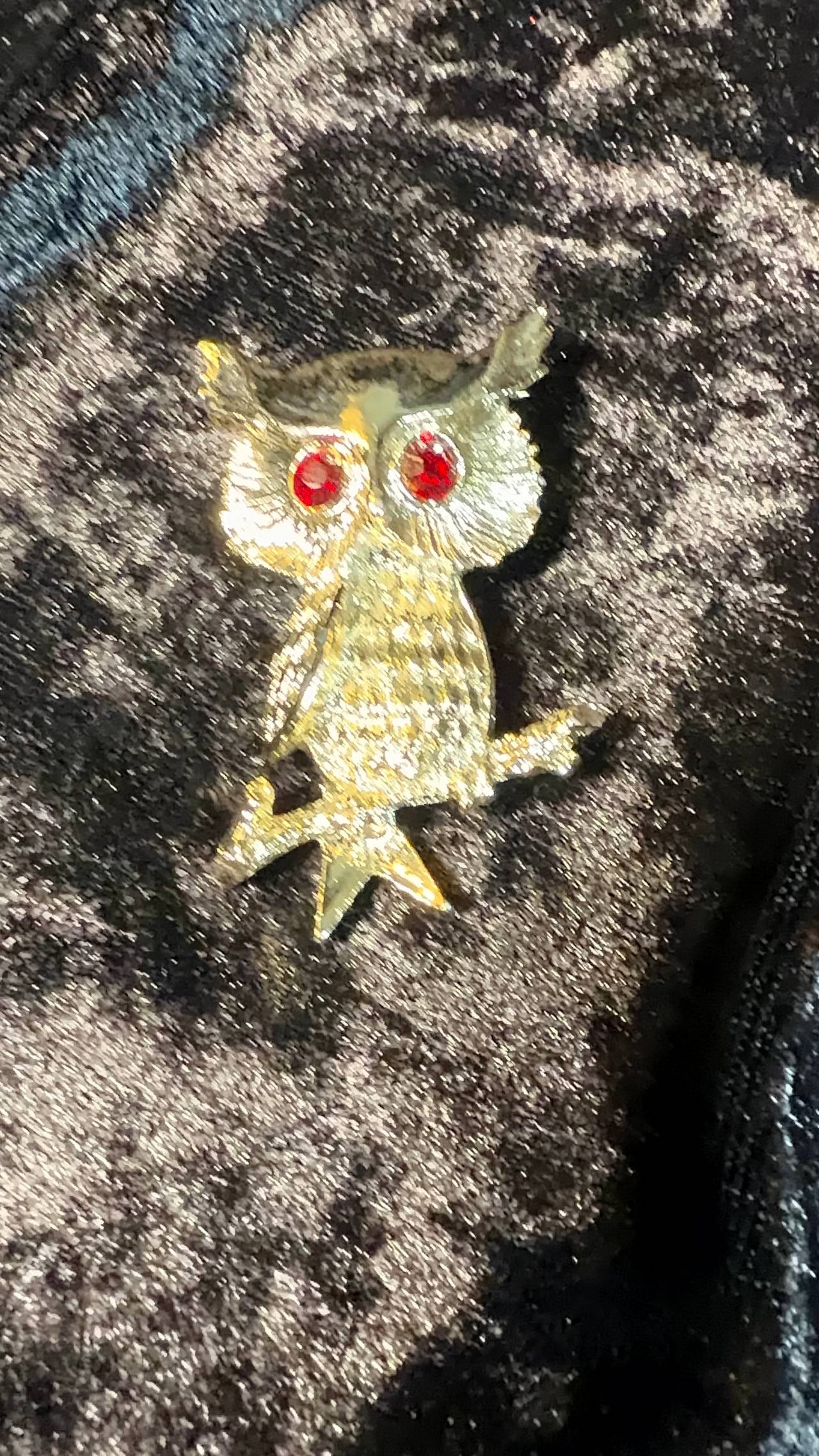 Vintage signed Gerry's gold-tone owl brooch with red rhinestone eyes.
