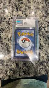 Pokémon Mela 140/131 Prismatic Evolutions CGC 10 Gem Mint - Image 2
