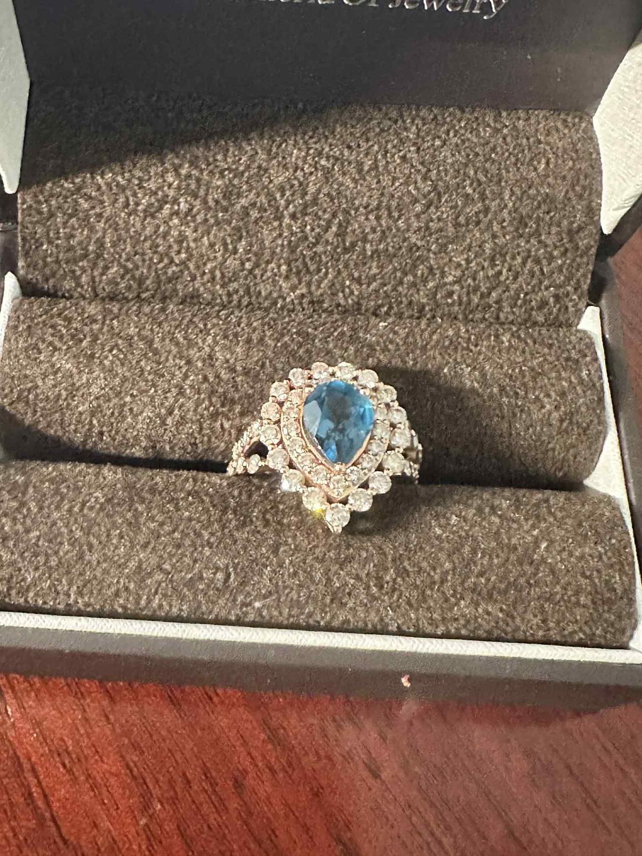Blue Topaz and Diamond Halo Ring