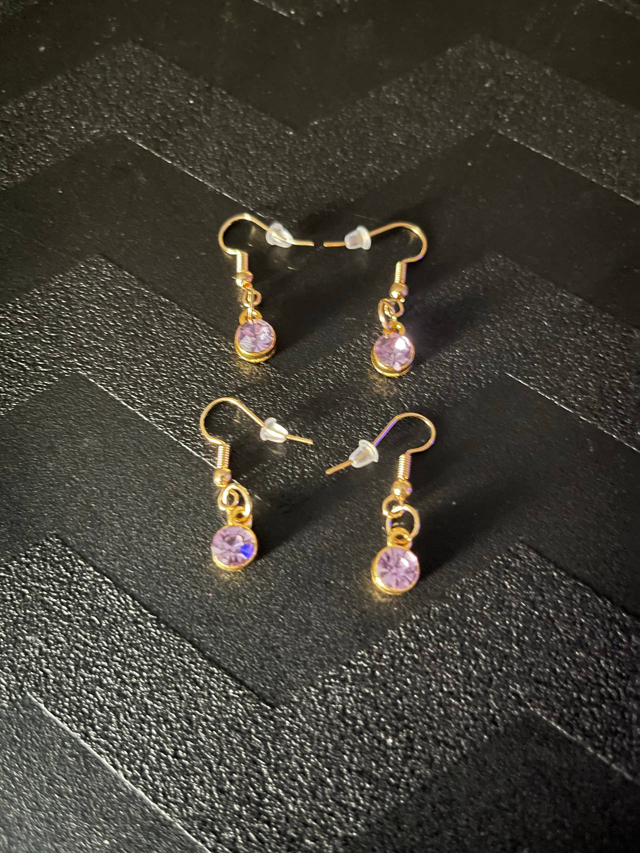 Gold Tone Dangle Earrings with Purple Gemstone