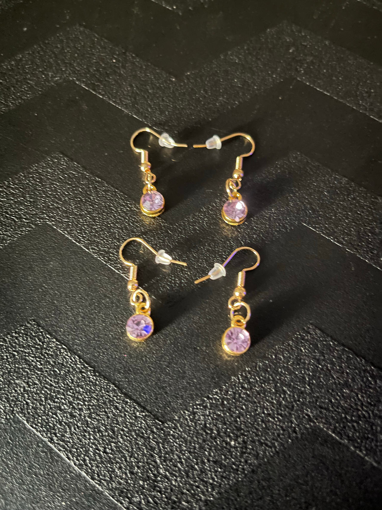 Gold Tone Dangle Earrings with Purple Gemstone