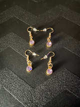 Gold Tone Dangle Earrings with Purple Gemstone - Image 1