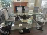 Glass Dining Table Set with Gray Upholstered Chairs - Image 1